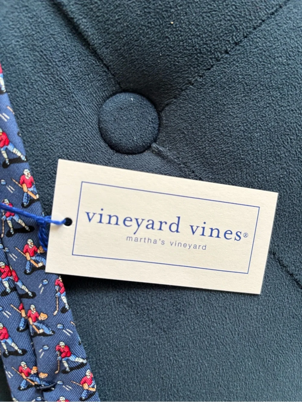Vineyard Vines Navy Silk Tie with Red and Gold Hockey Players